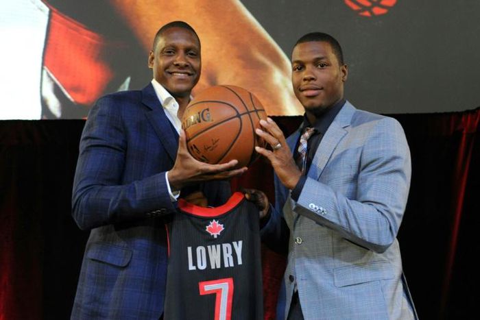 Toronto Raptors president Masai Ujiri, at left alongside Raptors star Kyle Lowry, went from a boyhood in Nigeria to making decisions that could bring the NBA title to Toronto