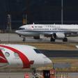 Air China Boeing 737 MAX 8 planes on the apron after after being grounded at Beijing Capital Airport. China's three biggest airlines have filed claims seeking compensation from Boeing over the grounding