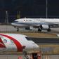 Air China Boeing 737 MAX 8 planes on the apron after after being grounded at Beijing Capital Airport. China's three biggest airlines have filed claims seeking compensation from Boeing over the grounding