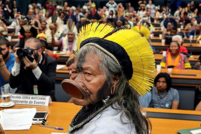 Kayapo ethnic group leader Raoni Metuktire attends a meeting with deputies to discuss the rights of indigenous people at the National Congress in Brasilia, on April 25, 2019