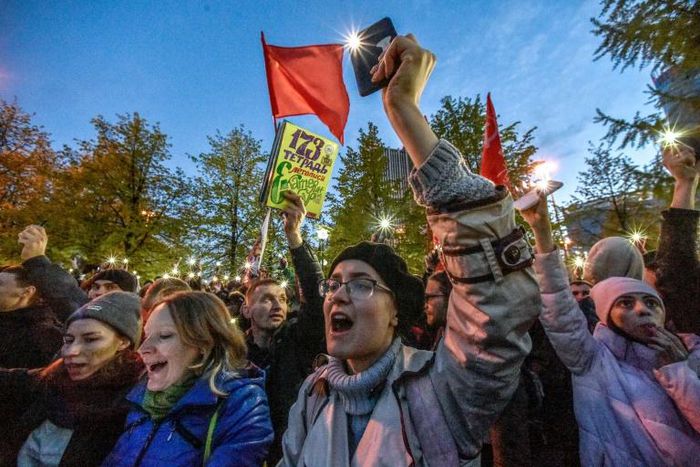 Activists protesting against a plan to build an Orthodox cathedral rally at a construction site in a park in the Russian Urals city of Yekaterinburg on May 15, 2019