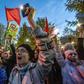 Activists protesting against a plan to build an Orthodox cathedral rally at a construction site in a park in the Russian Urals city of Yekaterinburg on May 15, 2019