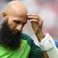 South Africa's Hashim Amla walks back to the pavilion after being hit on the head by England's Jofra Archer in the opening match of the World Cup