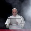 Pope Francis stands at the window of the Apostolic Palace overlooking St Peter's square in the Vatican