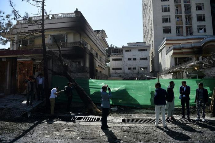 The talks between the Taliban and Washington in Qatar come just a day after the Taliban attacked a US-funded aid group in Kabul