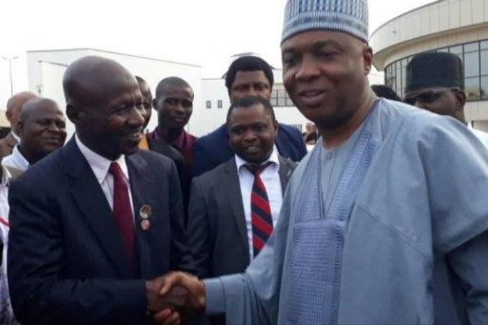 Senate President Bukola Saraki pumps fists with EFCC boss Ibrahim Magu. The senate has refused to confirm Magu as substantive EFCC Chairman
