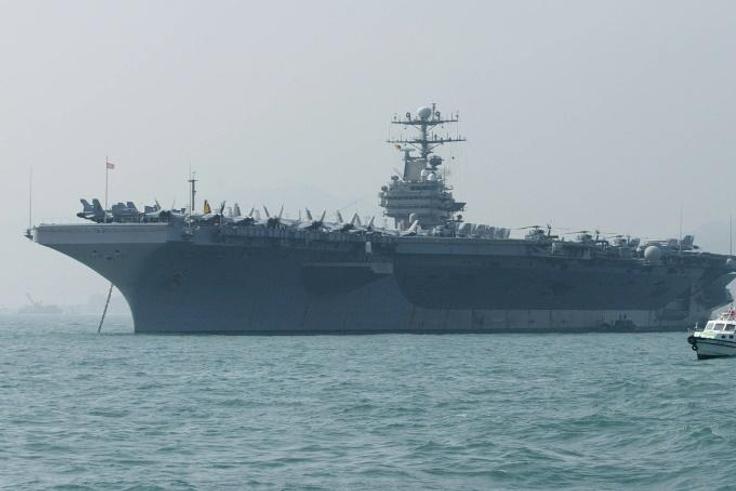 The United States says it is deploying the USS Abraham Lincoln, seen here in December 2004, in response to 'escalatory indications' from Iran
