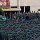 This handout picture released by the presidency shows Venezuela's Nicolas Maduro addressing troops after a failed military uprising