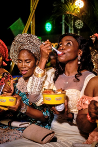 Guests enjoying the great taste and great aroma of Onga Ofada and Ayamase