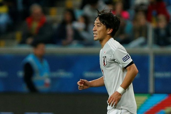 Japan's Koji Miyoshi celebrates after scoring during the 2-2 draw with Uruguay at the Copa America
