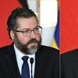 Brazilian Foreign Minister Ernesto Araujo (L) is likely to adopt a more conciliatory tone when he meets his Chinese counterpart Wang Yi (R) in the Brazilian capital of Brasilia