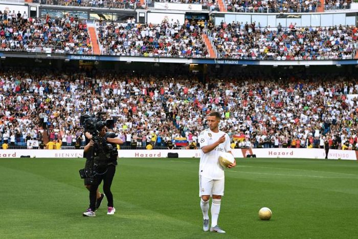 Eden Hazard walks onto the pitch during his official presentation at Real Madrid