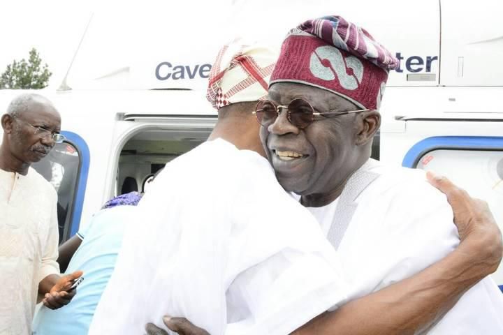 Governor Rauf Aregbesola (left) hugs former Lagos state governor, Asiwaju Bola Tinubu (right) after the APC chieftain visited him in Osogbo on Wednesday, August 2, 2017 to condole with him over the death of his mother, Alhaja Saratu