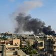 Plumes of smoke rise from the Tripoli suburb of Tajoura after it was hit by an air strike launched by forces loyal to Libya strongman Khalifa Haftar