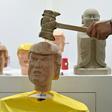 A kiosk at a Shanghai electronics fair is offering visitors the chance to smash a life-sized likeness of Donald Trump with a hammer
