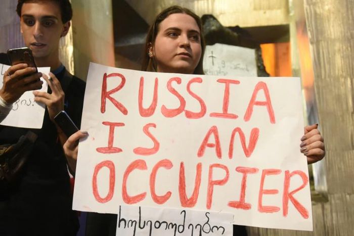 Protests erupted in Tbilisi after a Russian MP addressed parliament from the speaker's seat -- a controversial move in a country at loggerheads with Moscow