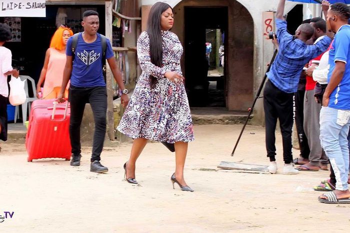 Jenifa and Timini on the set of 'Aiyetoro town' [Instagram/officialaiyetorotown]