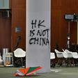 The protesters smashed their way into the former British colony's legislative building,prompting a diplomatic feud between Beijing and London