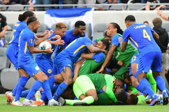Curacao players celebrate after Jurien Gaari's injury time goal lifted them to a 1-1 draw against Jamaica in a CONCACAF Gold Cup Group C match