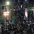 People arrive for a candlelight vigil at Victoria Park in Hong Kong on June 4, 2019, to mark the 30th anniversary of the 1989 Tiananmen crackdown in Beijing