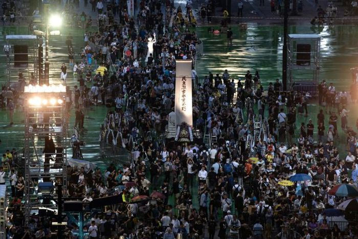 People arrive for a candlelight vigil at Victoria Park in Hong Kong on June 4, 2019, to mark the 30th anniversary of the 1989 Tiananmen crackdown in Beijing