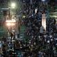 People arrive for a candlelight vigil at Victoria Park in Hong Kong on June 4, 2019, to mark the 30th anniversary of the 1989 Tiananmen crackdown in Beijing