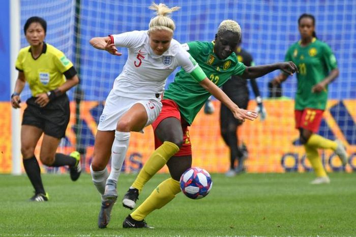 England captain Steph Houghton (L) in action in Sunday's win over Cameroon at the women's World Cup