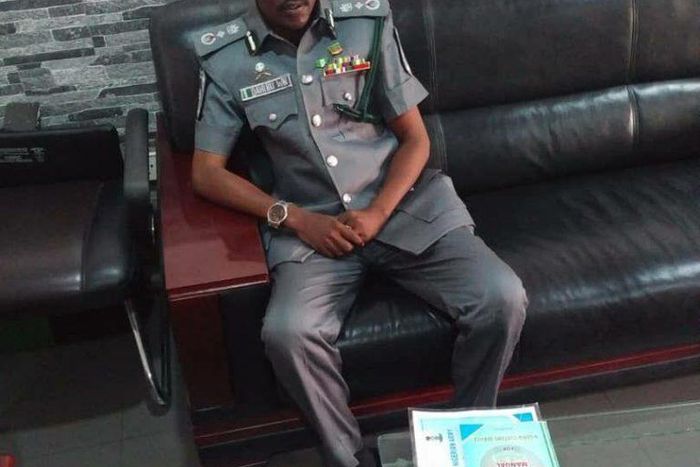 Nura Dahiru, an assistant superintendent of customs sitting in CG's office (Twitter @@CustomsNG)