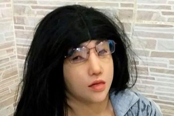 Brazilian prison inmate Clauvino da Silva after being caught attempting to escape disguised as his daughter