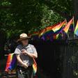 A park ranger places rainbow flags at the Stonewall National Monument, the first LGBTQ national monument, dedicated to the birthplace of modern lesbian, gay, bisexual, transgender, and queer civil rights movement on June 4, 2019 in New York City