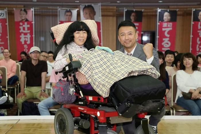 Newly elected lawmaker Eiko Kimura, who is paralysed from the neck down, has called for a system to ensure necessary care for the disabled