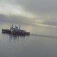 A Canadian research ice-breaker navigating in an ice-free passage through the Arctic Ocean in 2015