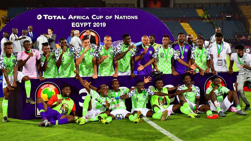 Nigerian players celebrate after winning the AFCON 2019 third place play-off