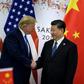 US officials will soon resume face-to-face trade talks in China, a White House official has said, reviving negotiations that had verged on collapse in May; in this image Xi Jinping (R) greets US President Donald Trump before a bilateral meeting on the ...