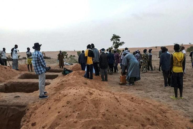 Mass graves were dug for victims of Sunday's attack, the latest episode of bloodshed in central Mali
