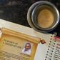 An image of "Dosa King" P. Rajagopal is printed on the menu at one of his restaurants in Chennai, India