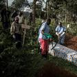 Health workers prepare to bury an Ebola victim in Butembo. More than 2,000 cases have been recorded since the disease broke out in eastern DR Congo 10 months ago