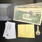 This undated image released by the publication Science, shows a clear wallet and its contents used in a study of how people in 40 countries decided to return, or not, “lost” wallets