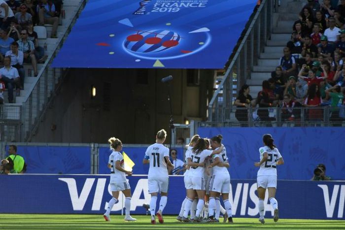 Germany reached the quarter-finals of the women's World Cup with a 3-0 win over Nigeria on Saturday