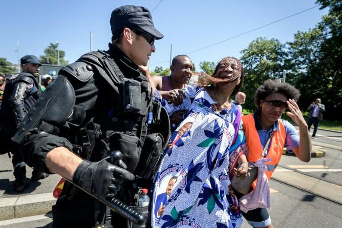 Swiss police fired water cannon and stun grenades at Cameroonian protesters outside the UN's European headquarters as the crowd surged towards a luxury hotel hosting Cameroon's president.