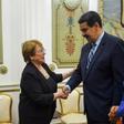 UN High Commissioner for Human Rights Michelle Bachelet (L) greets Venezuelan President Nicolas Maduro (C) next to his wife Cilia Flores at Miraflores Presidential Palace in Caracas, on June 21, 2019