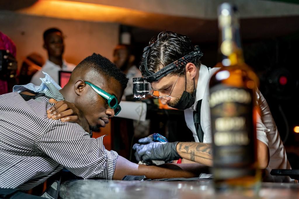 stephen tayo & Elie Akkary at the Jameson Hats and Tatts party