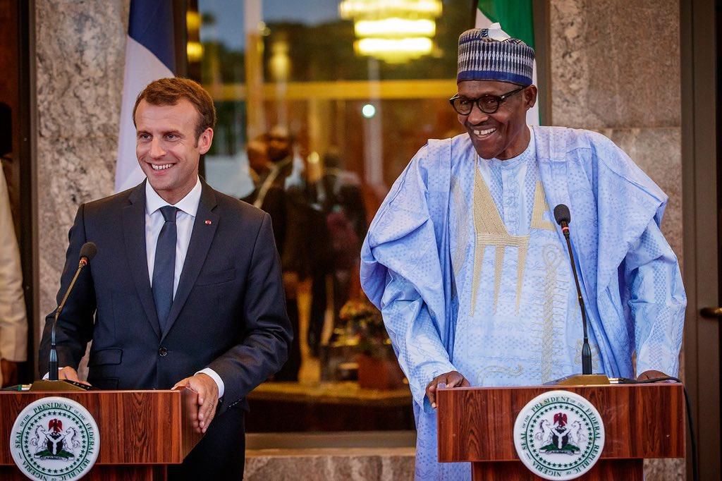 French President, Emmanuel Macron (L) and President Buhari (R) during a press conference.