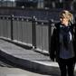 Argentinian Ezequiel Villalonga (R), 18, a victim of sexual abuse, walks with his mother Natalia along a street in Mendoza, Argentina