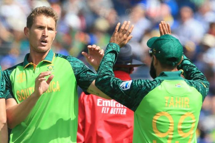 South Africa's Dwaine Pretorius (left) celebrates after dismissing Sri Lanka's Kusal Perera in their World Cup match