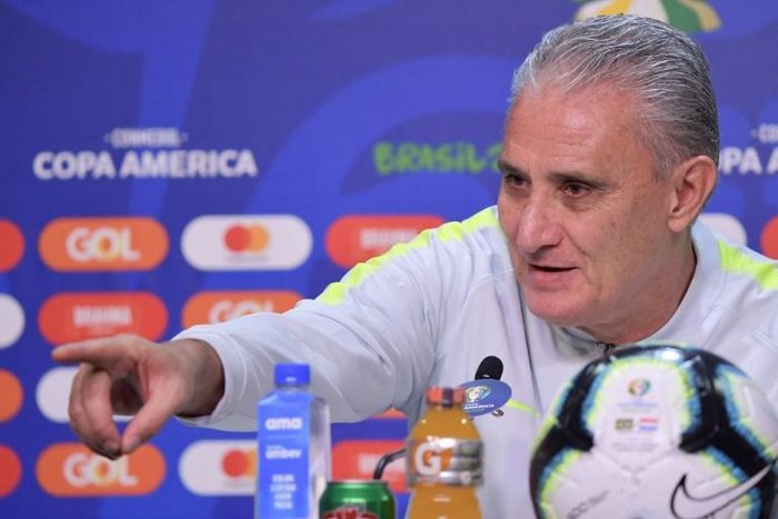 Brazil's coach Tite gestures as he speaks during a press conference in Porto Alegre, Brazil on the eve of the Copa America quarterfinal football match against Paraguay.