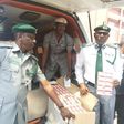 The Customs Area Controller of Apapa Command,  Comptroller Mohammed Abba-Kura  displaying the 10 cartons intercepted tramadol of 225mg in an ambulance which was arrested by the command [NAN]