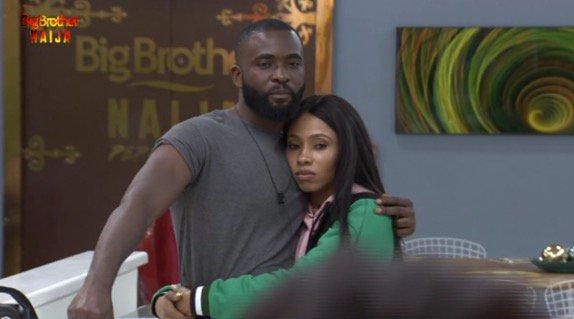 Gedoni and Mercy cuddle up in the BBNaija house. [Twitter/BBNaija]