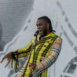 Burna Boy performs at Coachelle wearing Kenneth Ize [Credit: Twitter/ Coachella]
