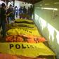 The overloaded passenger boat was carrying more than 60 people when it overturned in rough seas near Madura island